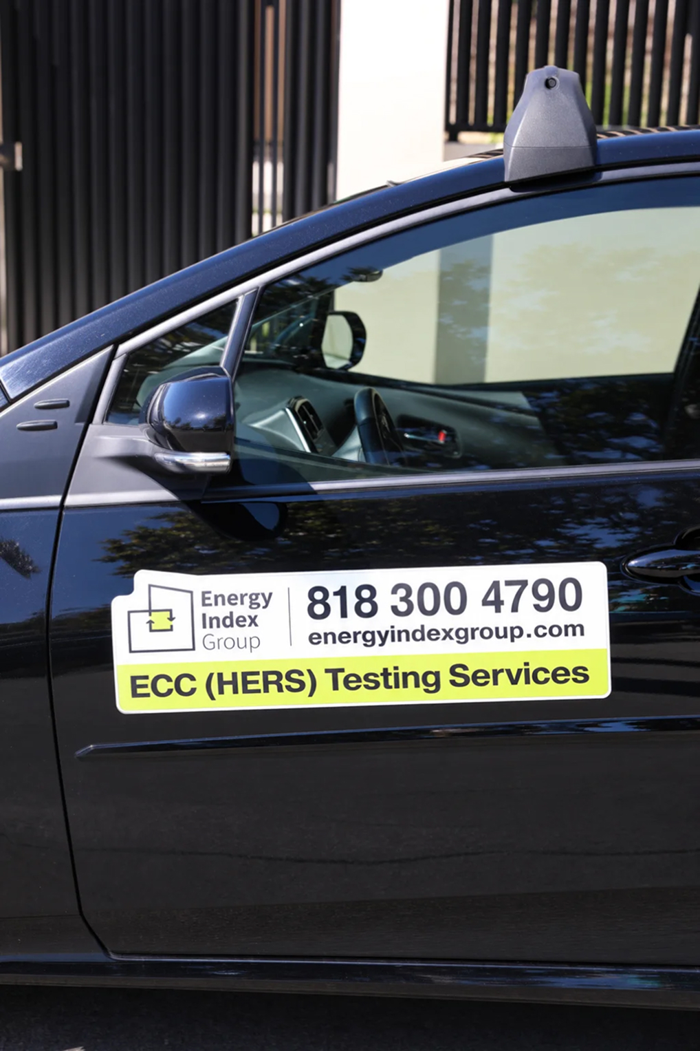 A bold vehicle magnet turns the field team's cars into mobile           signage, featuring the logo, service name, and website in the brand's           high-contrast palette so the company stays visible on-site and on the           road across the counties it serves.
